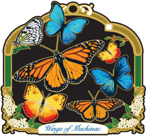 Colourful butterfly ornament with a brass and green arched frame. Has a white plaque at the bottom that reads “Wings of Mackinac” in cursive blue font.