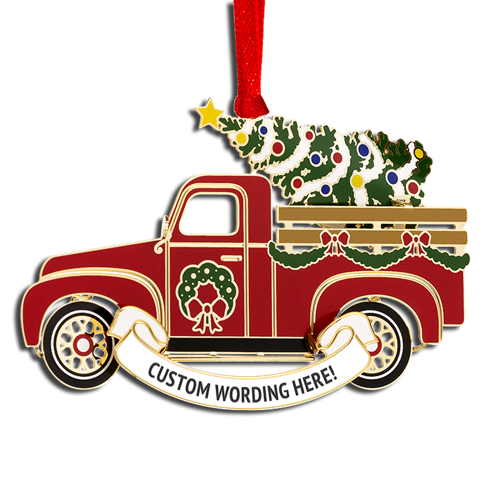 Red truck ornament carrying a decorated green Christmas tree. A white banner at the bottom reads “CUSTOM WORDING HERE!” in black.